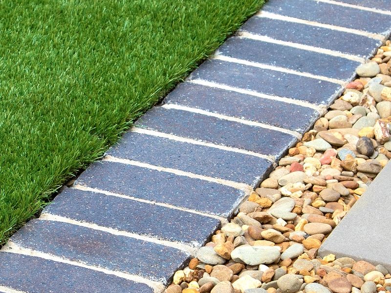 Artificial grass and landscaping installation